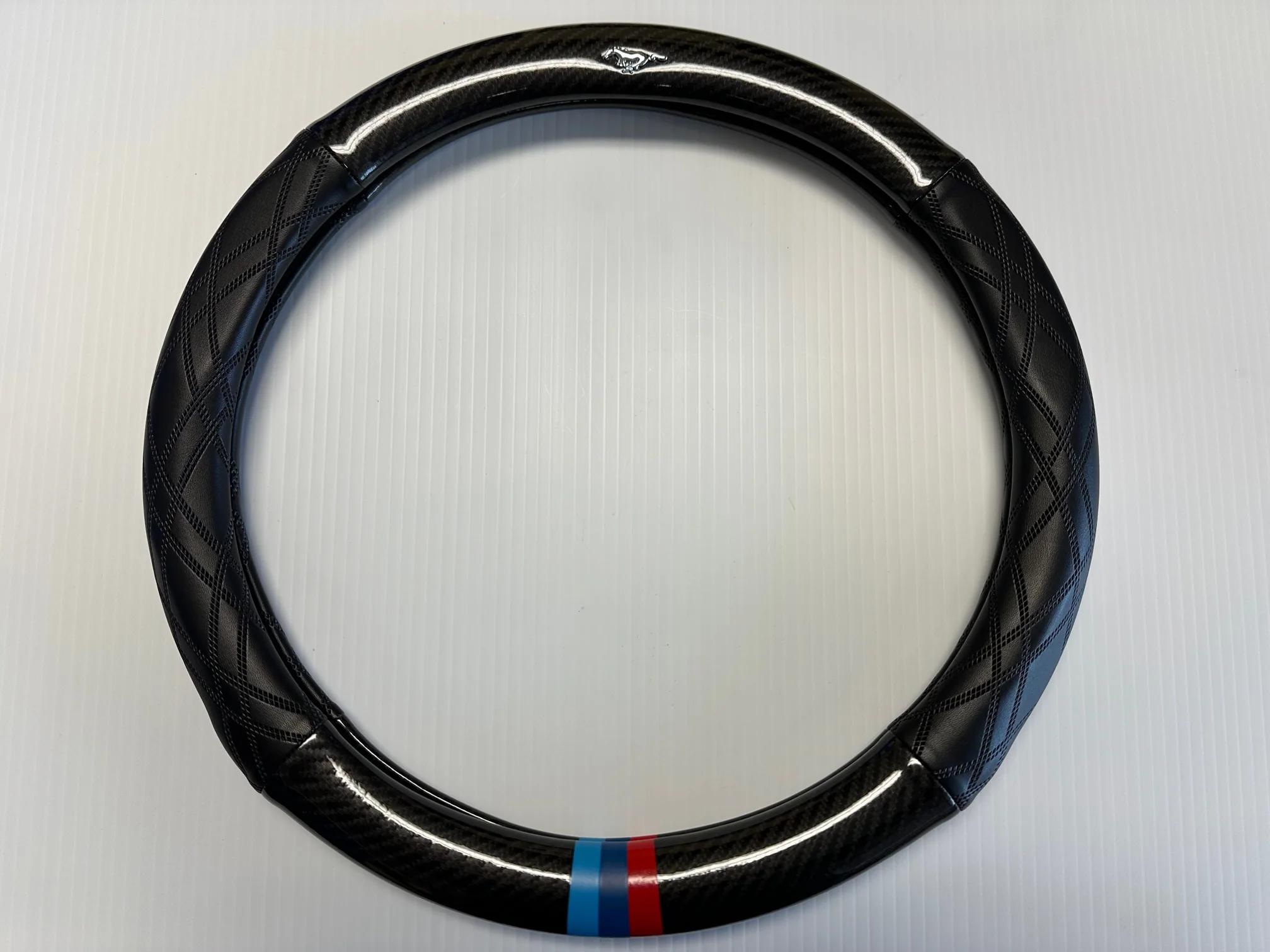 Mustang Mach-E Steering Wheel Cover, Leather, Carbon Fiber, with Logo, 2021-2025